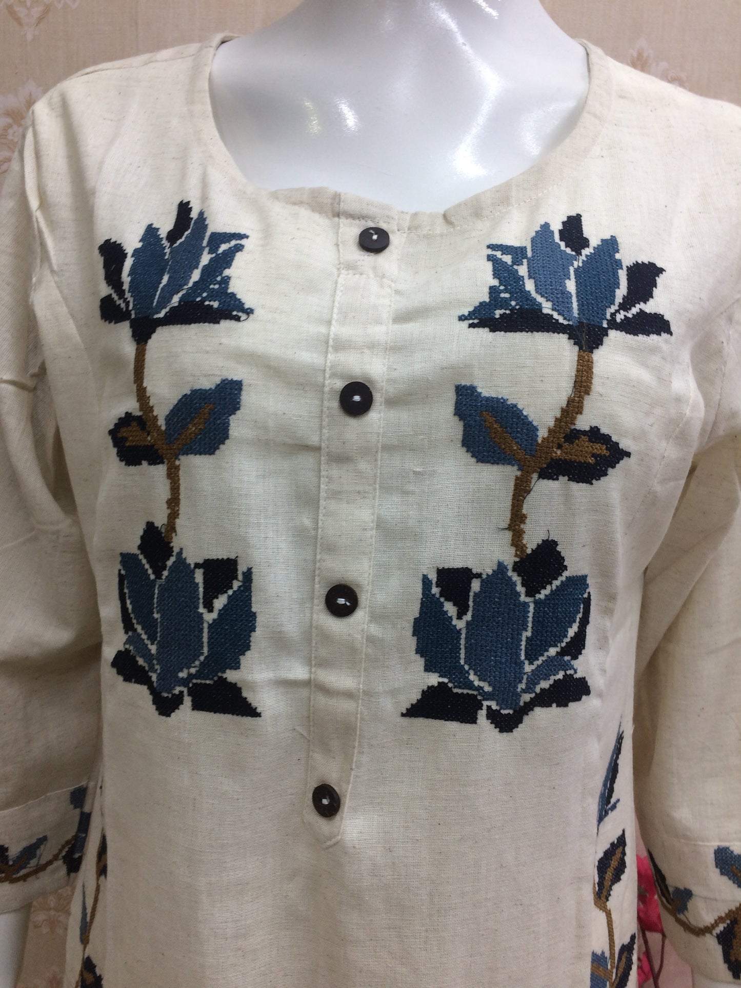 Elegant cream kurti with blue floral embroidery