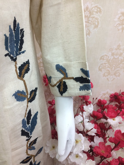 Elegant cream kurti with blue floral embroidery