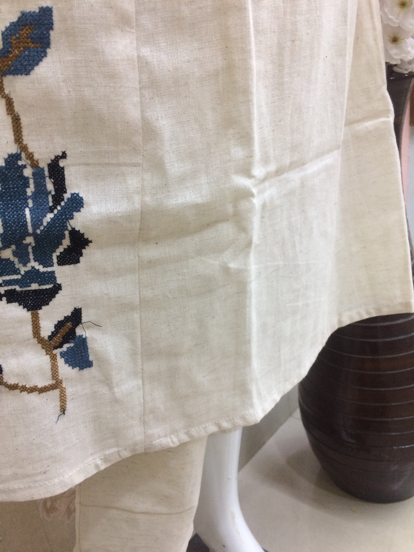 Elegant cream kurti with blue floral embroidery