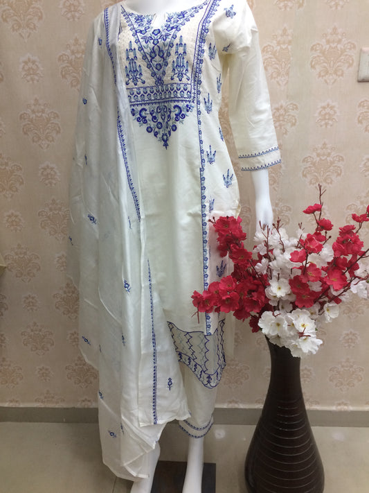 White dress blue thread work dress airport