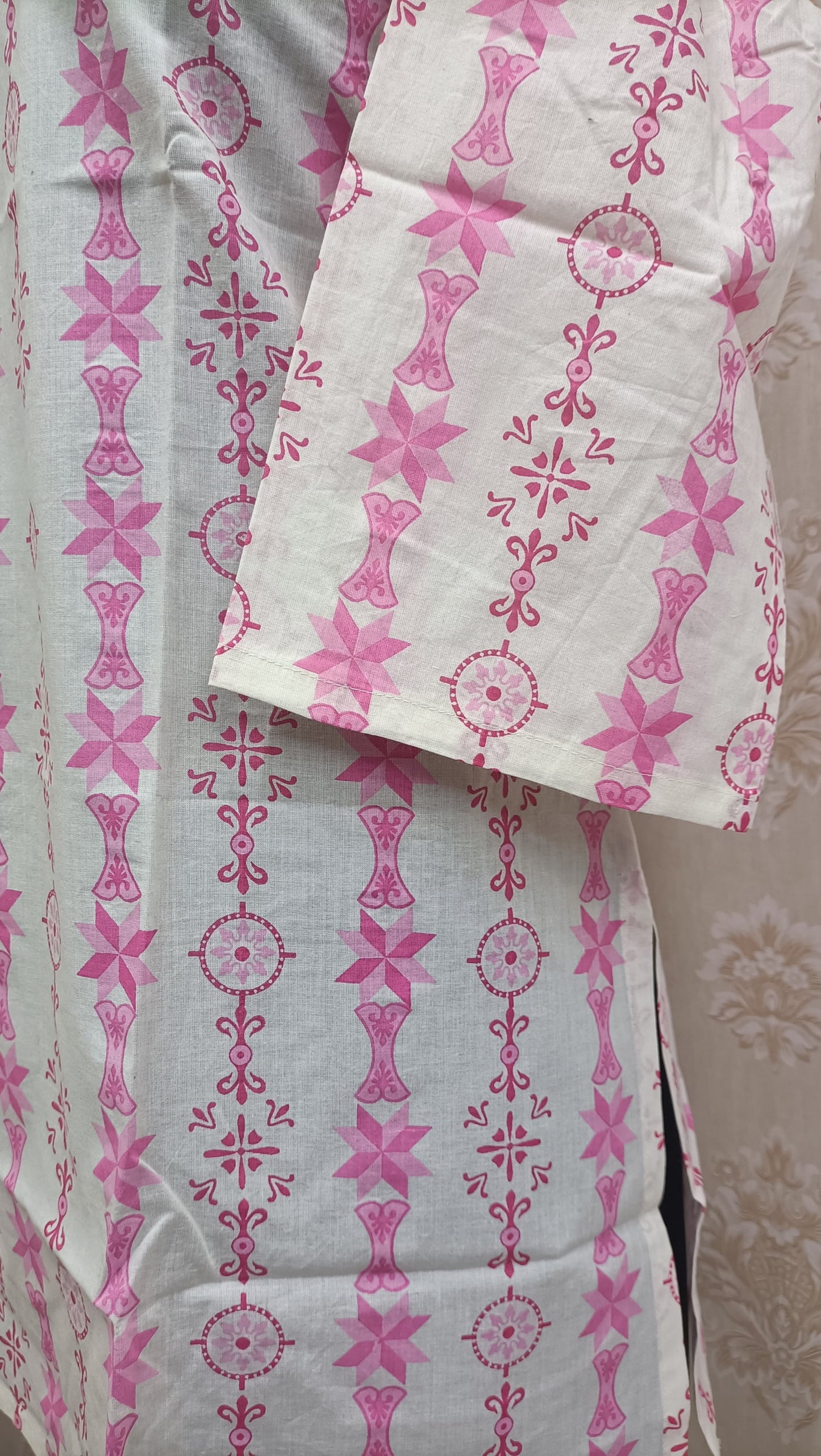 pink and white printed cotton kurti