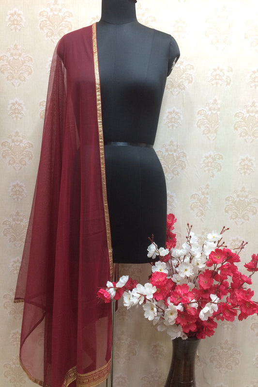 Red net dupatta with golden print lace